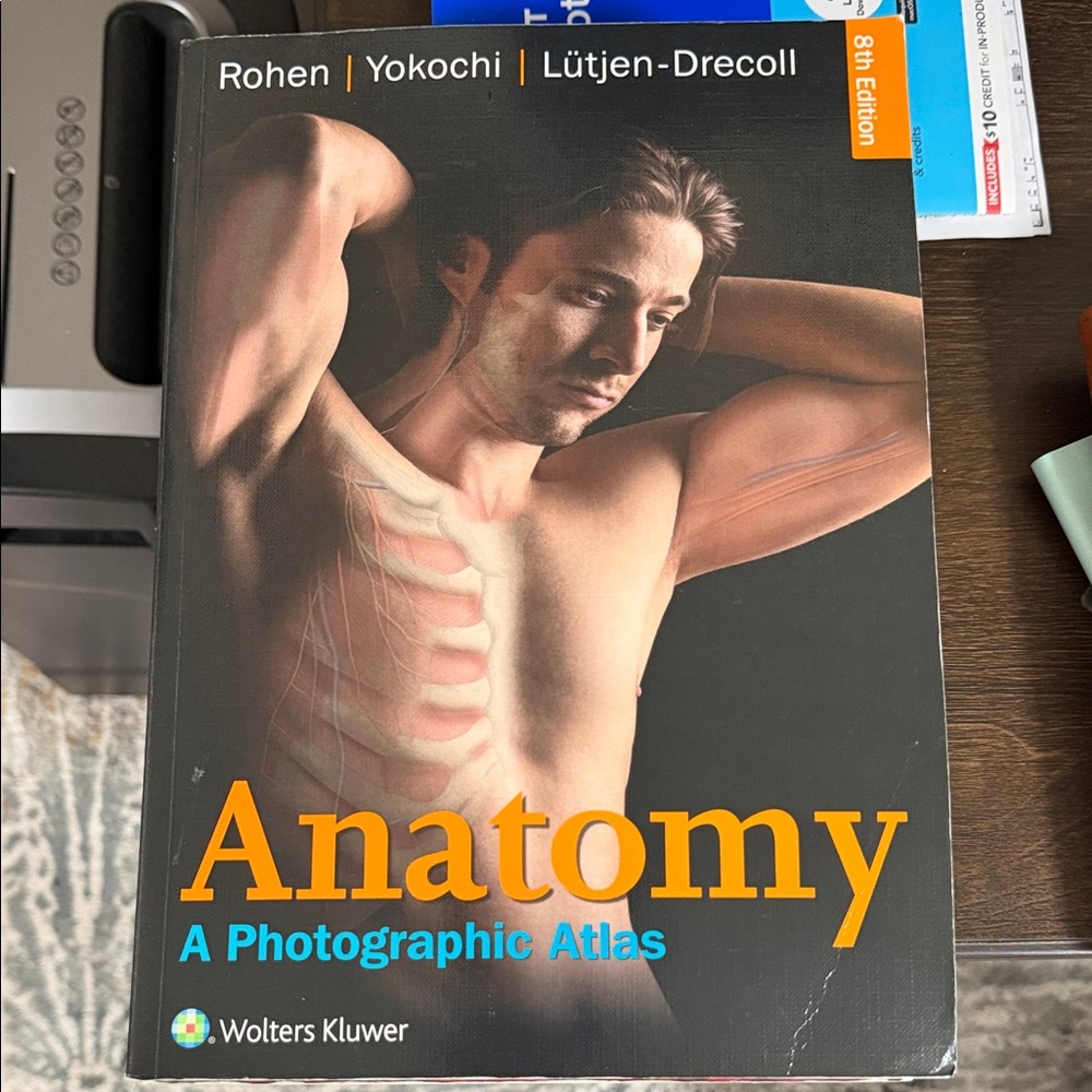 Wolters Kluwer Anatomy: A Photographic Atlas - Black Cover with Orange Title